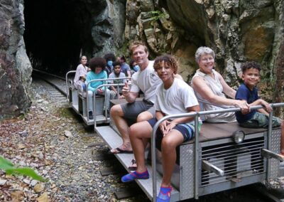 electric train cars coming through tunnel
