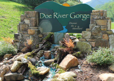 Doe River Gorge sign and stone mounting