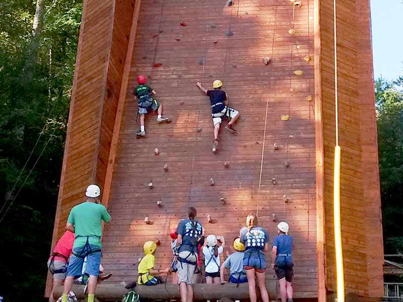 kids on climbing tower