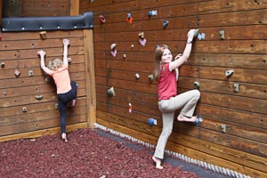 kids on bouldering wall