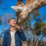 David Rives with giraffe