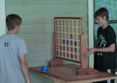 boys playing giant connect 4