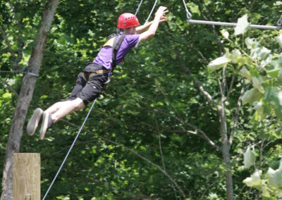kid jumping off pamper pole