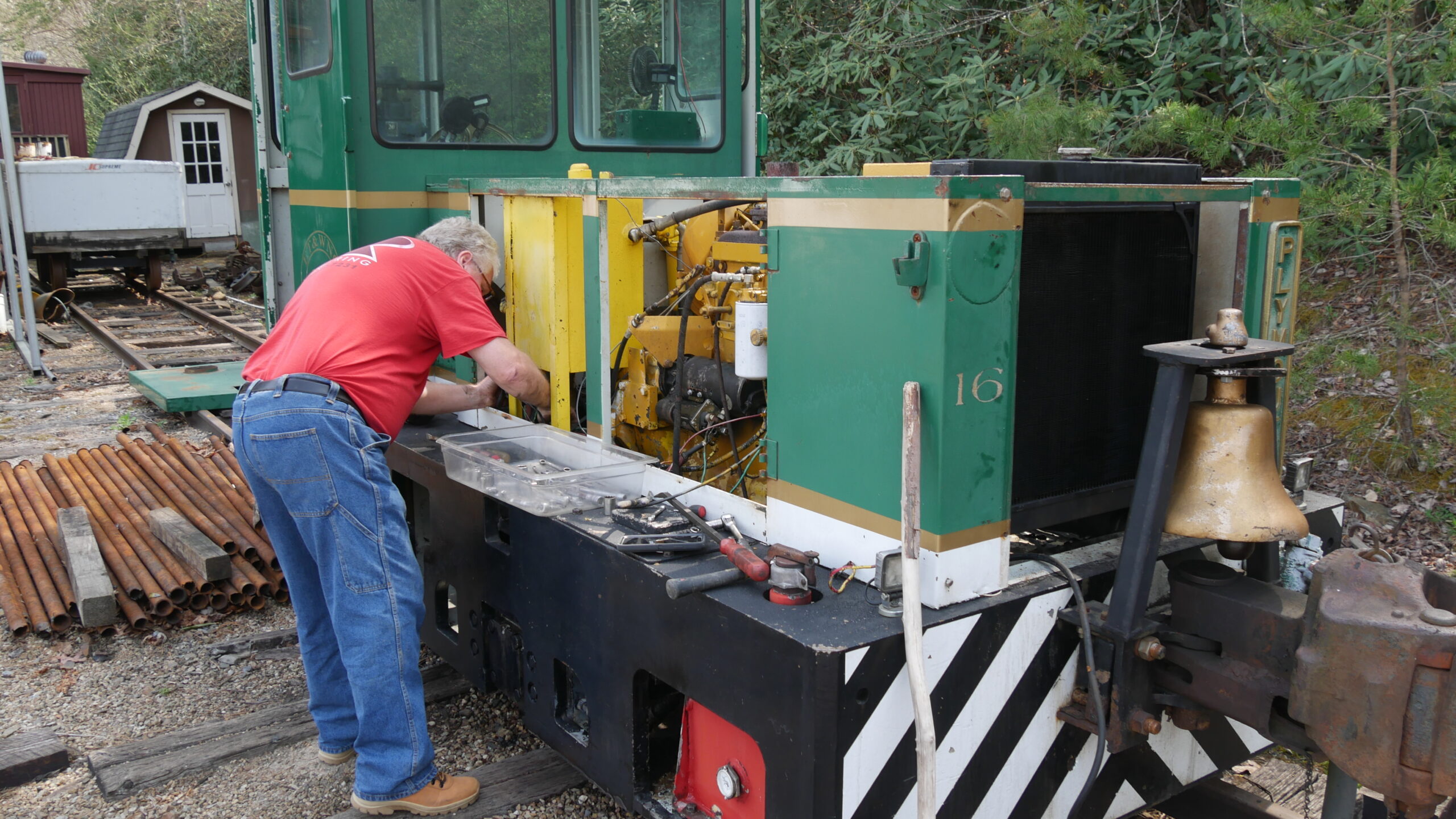 David Poteat working on diesel engine